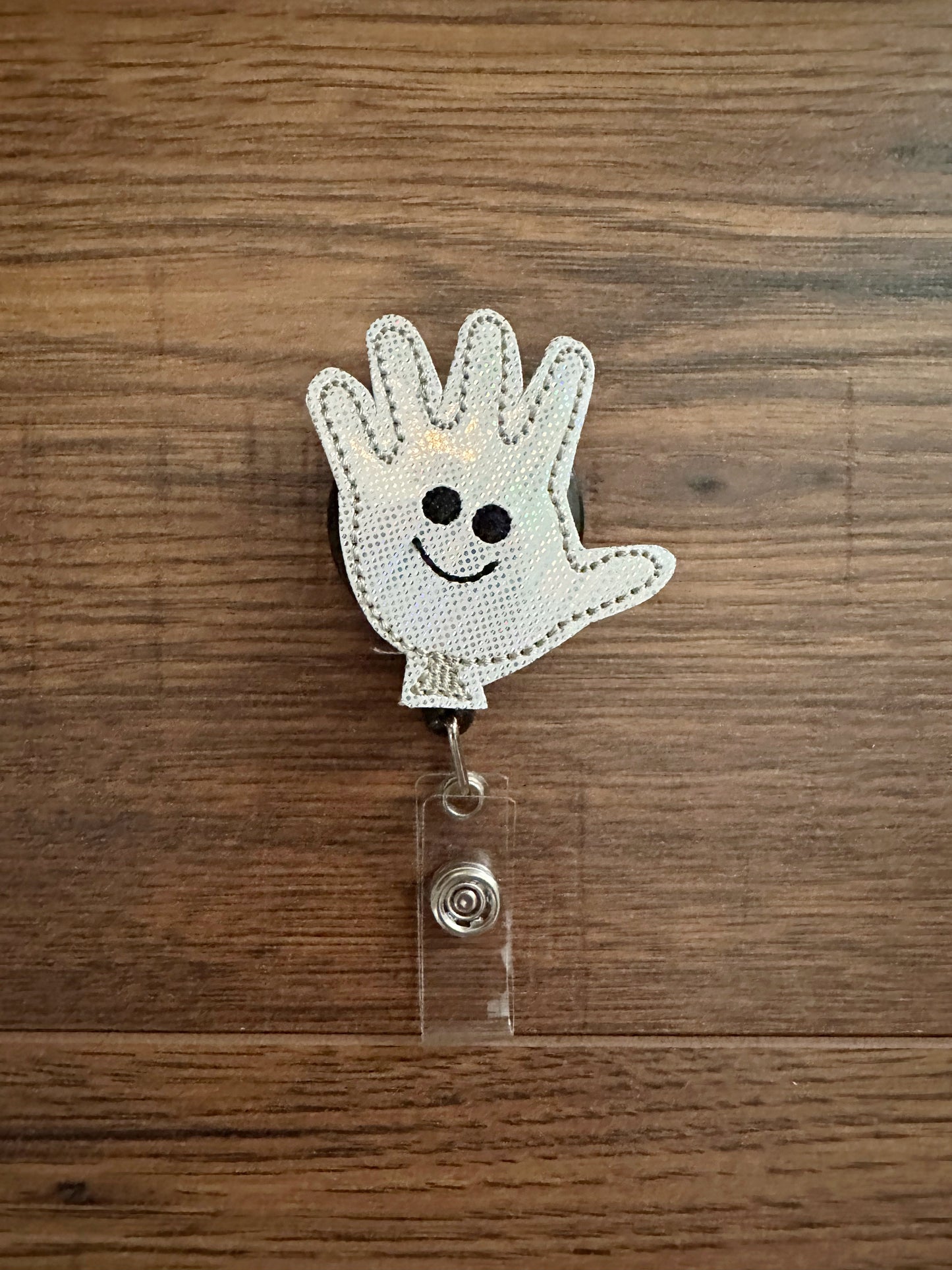 Happy face gloves badge reels