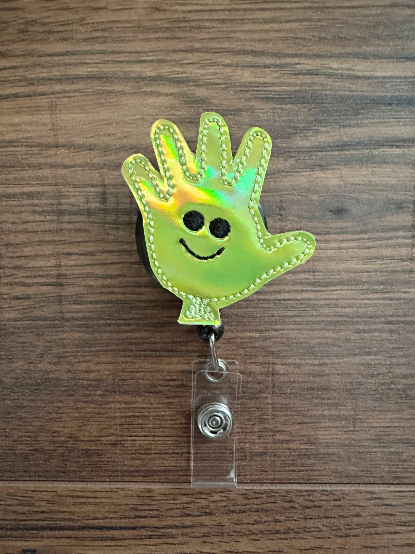 Happy face gloves badge reels