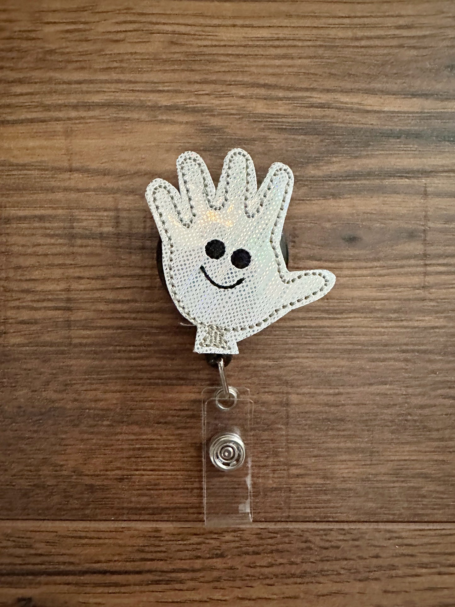 Happy face gloves badge reels