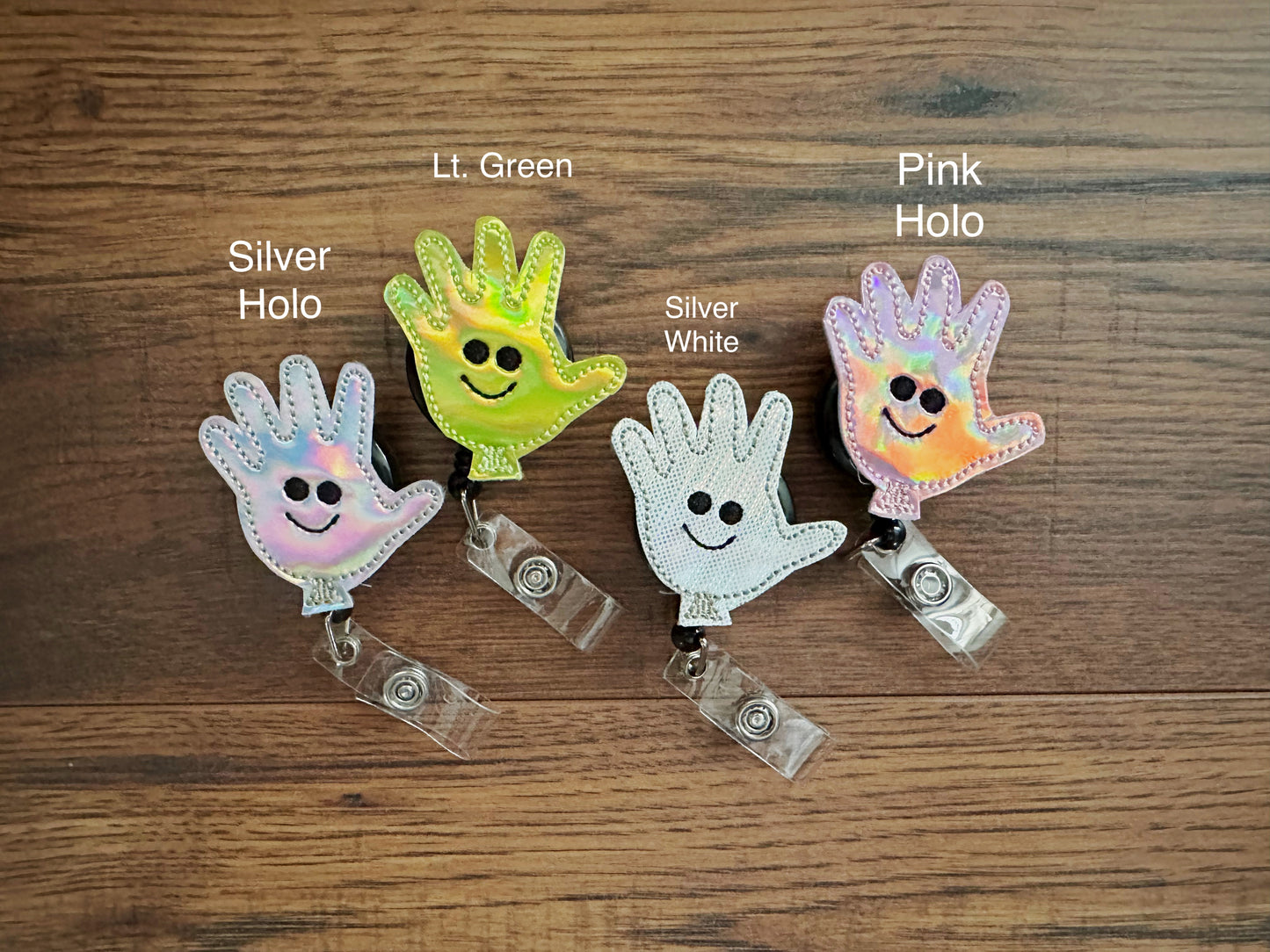 Happy face gloves badge reels