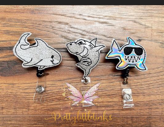 Shark badge reels