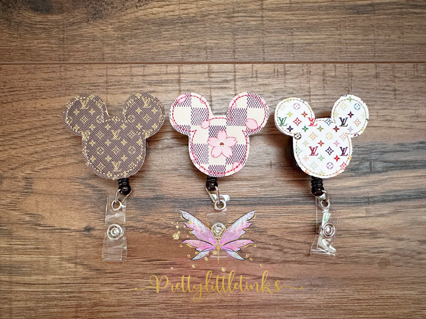 Mouse sillohuette badge reels