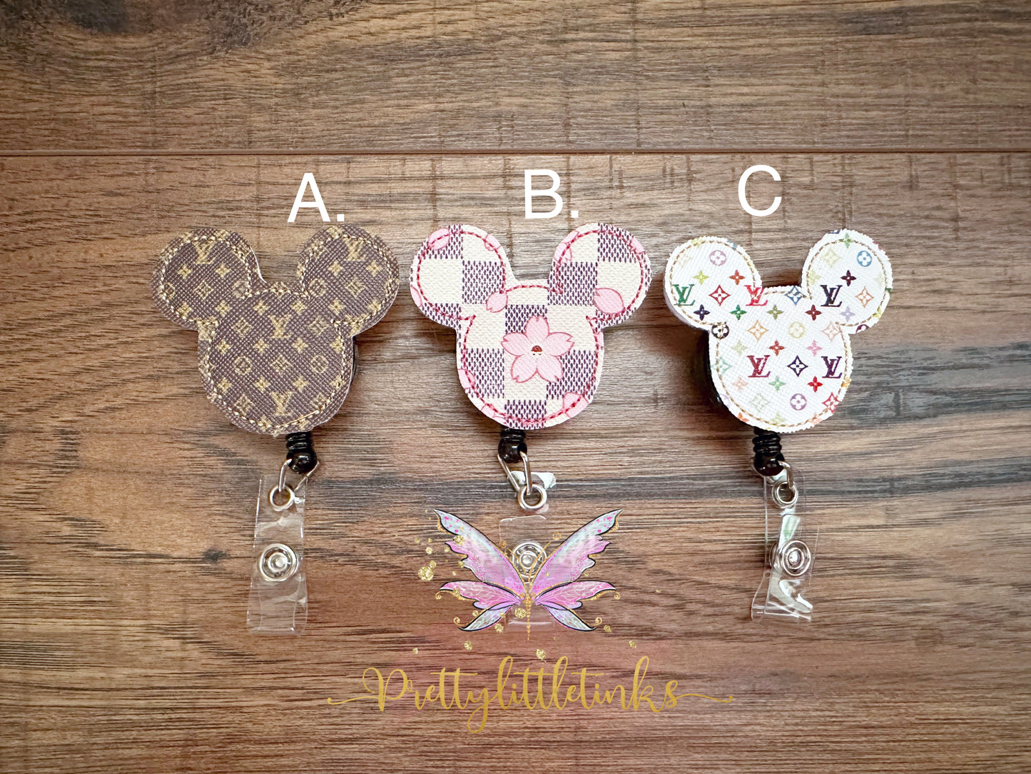 Mouse sillohuette badge reels